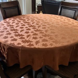 Three table linens, in excellent condition.